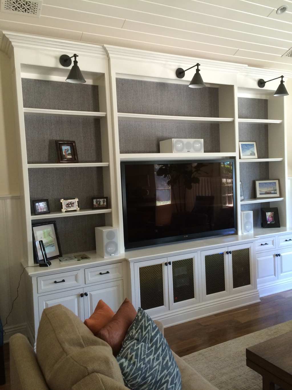 Custom television cabinet with light & storage on sides - Brentwood residence