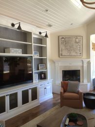 Custom television cabinet with light & storage on sides - Brentwood residence