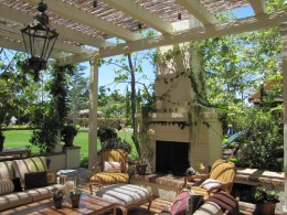 Pergola with trellis and outdoor fireplace alt view 3